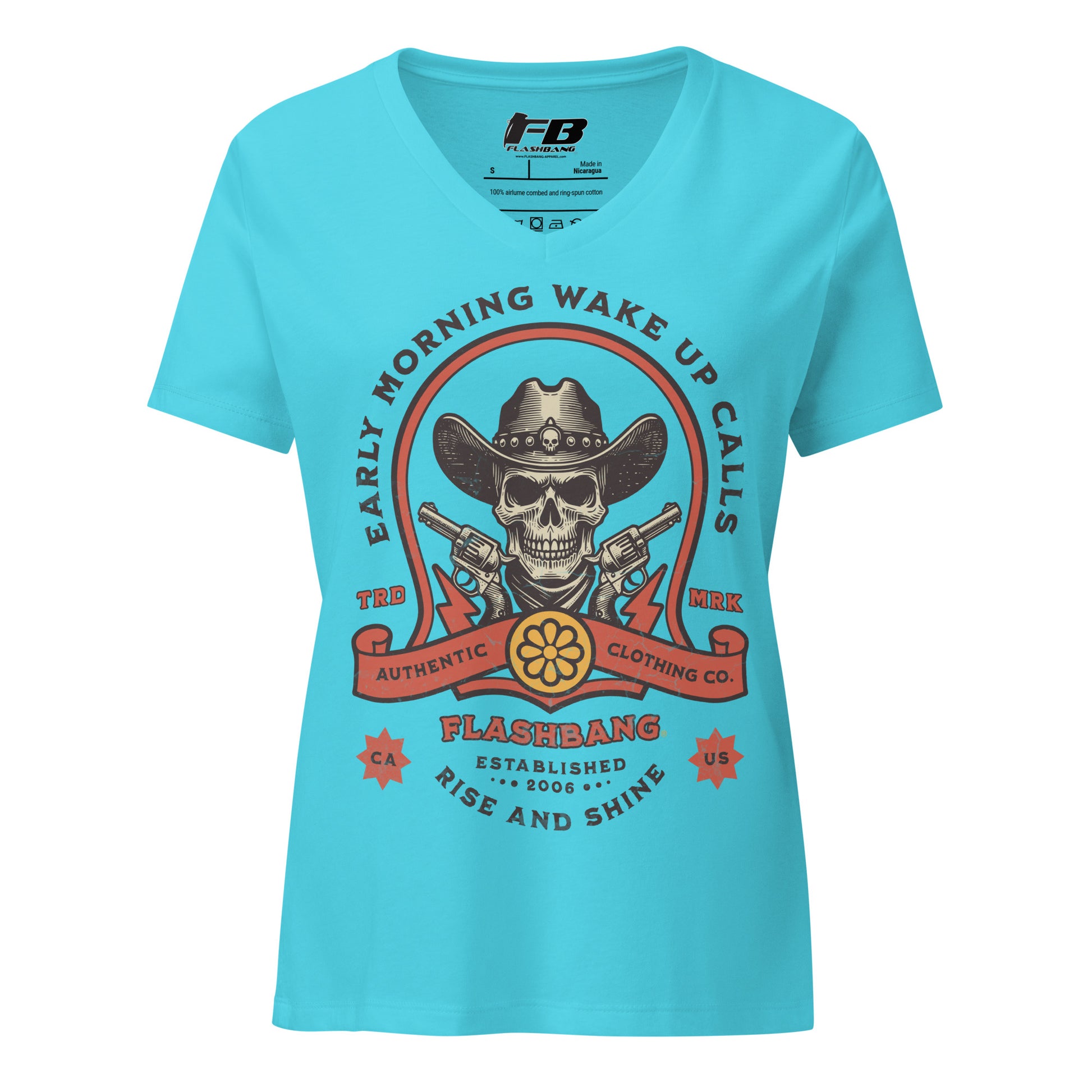 Blue t-shirt with a graphic design featuring a skull in a cowboy hat and boots, holding guns.