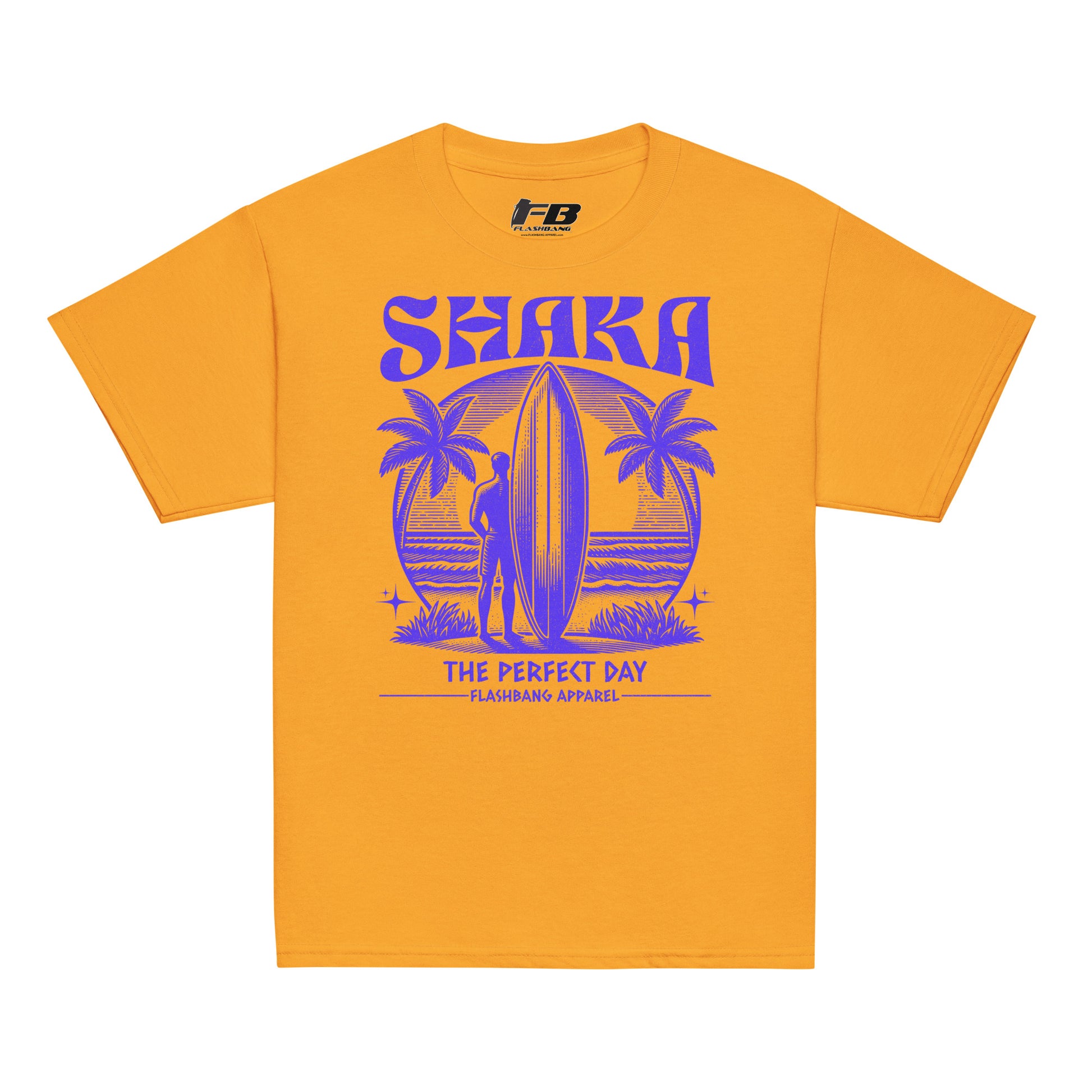 Yellow t-shirt with purple graphic design featuring a beach scene and 'SHAKA' text on a white background.
